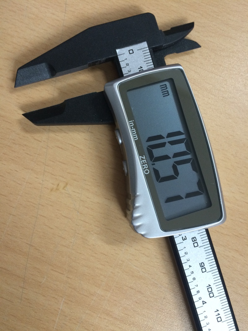 table, vernier caliper, tape measure, number, directly above, connection, wood - material, western script, no people, communication, still life, digital caliper