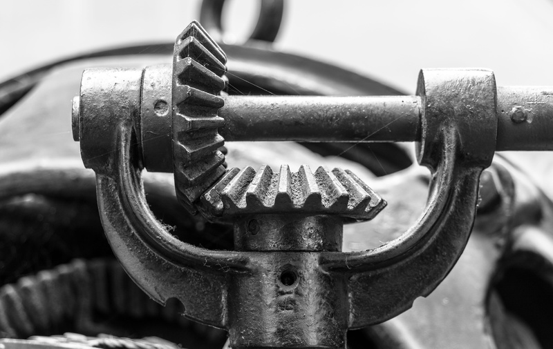 focus on foreground, no people, outdoors, mechanics, industry, transmission, machine, metal, day, drive, bevel, gear, connection, control, heavy, machine part