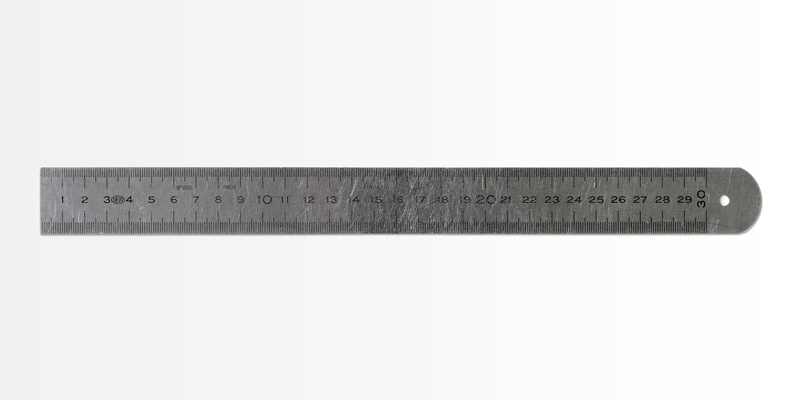 white background, cutting, knife - weapon, decimal, close-up, single object, tool, steel, number, millimeter, indoors, metal, hand tool, steel ruler, copy space