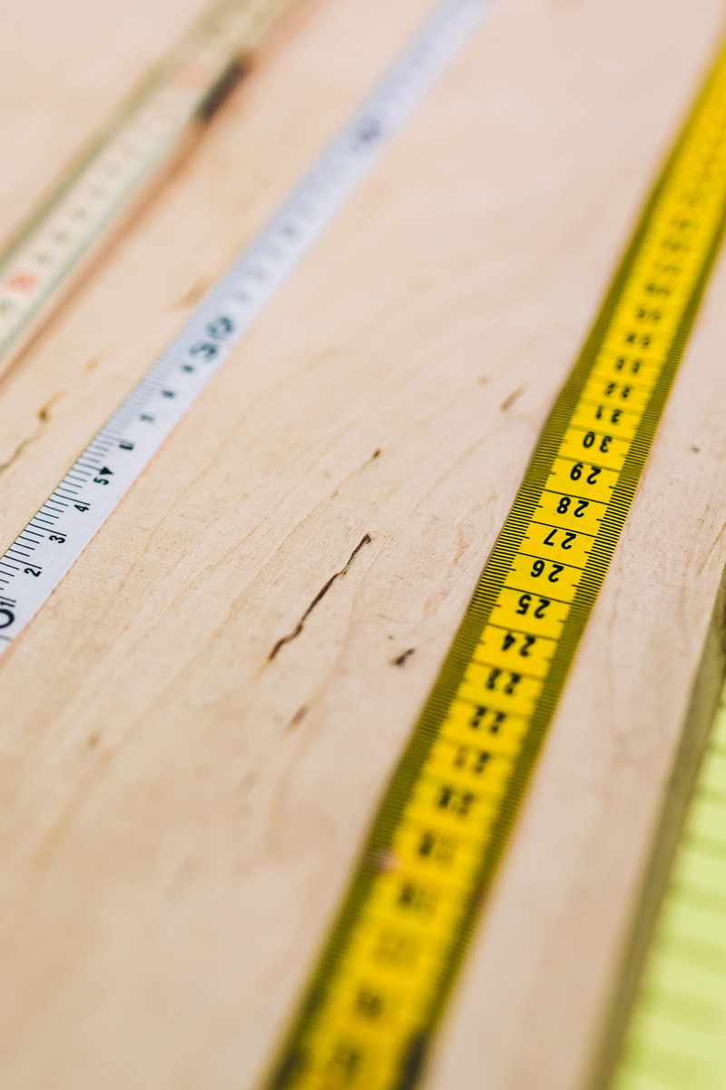 centimeter, 2K, wood, still life, closeup, high angle view, no people, studio shot, wooden, industry, accuracy, tape Measure, instrument of Measurement