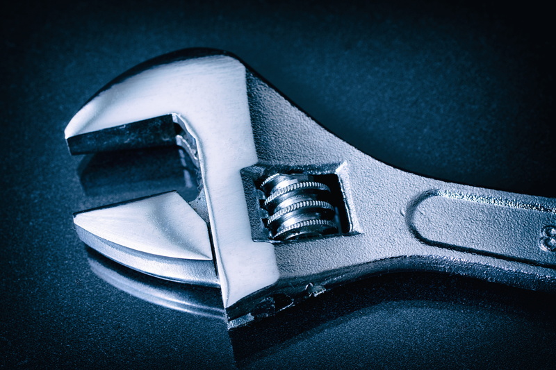 black background, team, security, metal, connection, indoors, selective focus, no people, construction, build, chrome, blue, workshop, car, single object