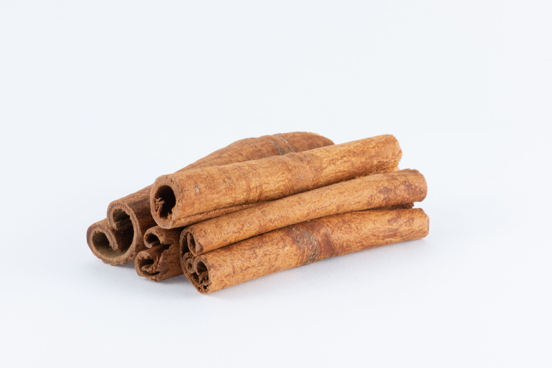 no people, spice, seasoning, cooking, sticks, still life, indoors, stack, aromatic, loaf of bread, french food, studio shot, white background, food and drink