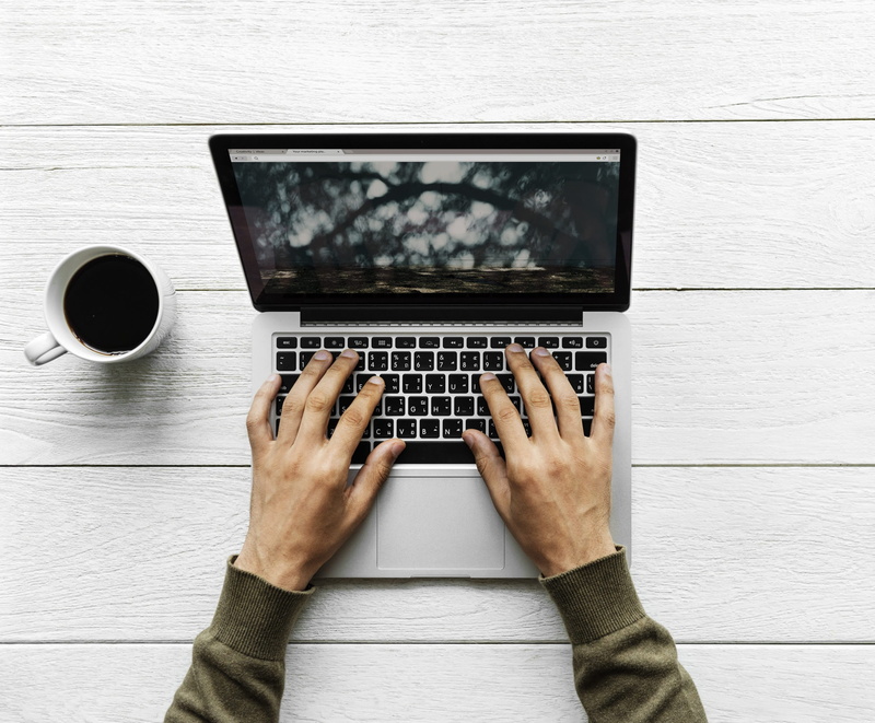 device, wooden, social media, media, human hand, browsing, white, leisure, man, computer equipment, digital, mug, person, body part, pro, using, notebook