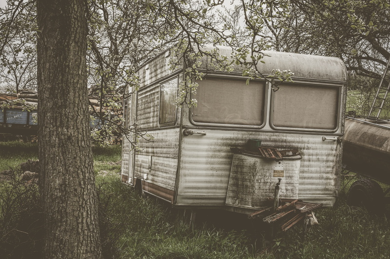 old, handrail, land vehicle, transportation, building, house, observatory, architecture, grass, day, rv, cabin, tree trunk, moving van, land, mode of transportation