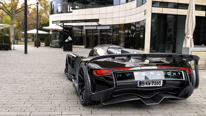 automotive, built structure, outdoors, vehicle, city, motor vehicle, performance, futuristic, supercar, stationary, sportscar, day, speed, fast, architecture