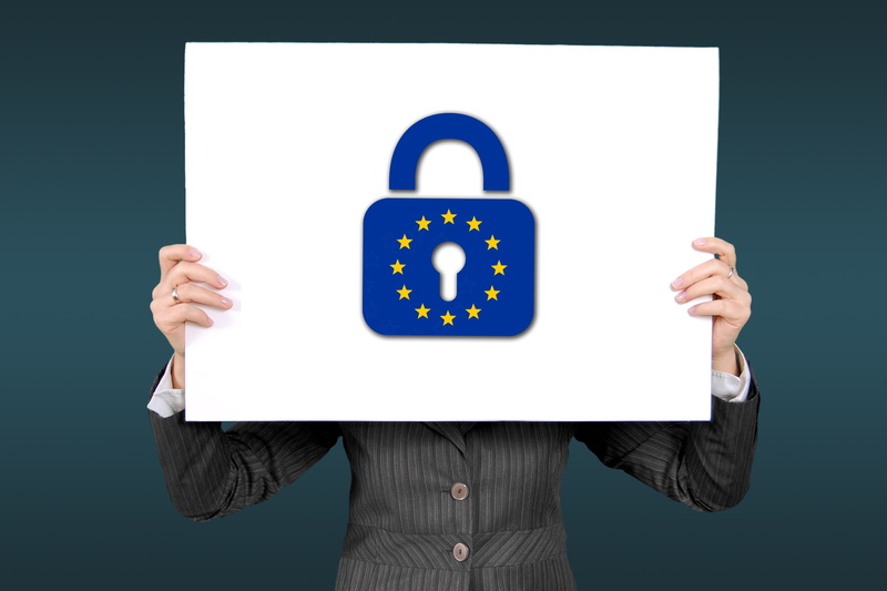 business, human body part, secure, sign, gdpr, information, one person, blue, data, menswear, studio shot, men, symbol, standing, privacy, 2K, communication