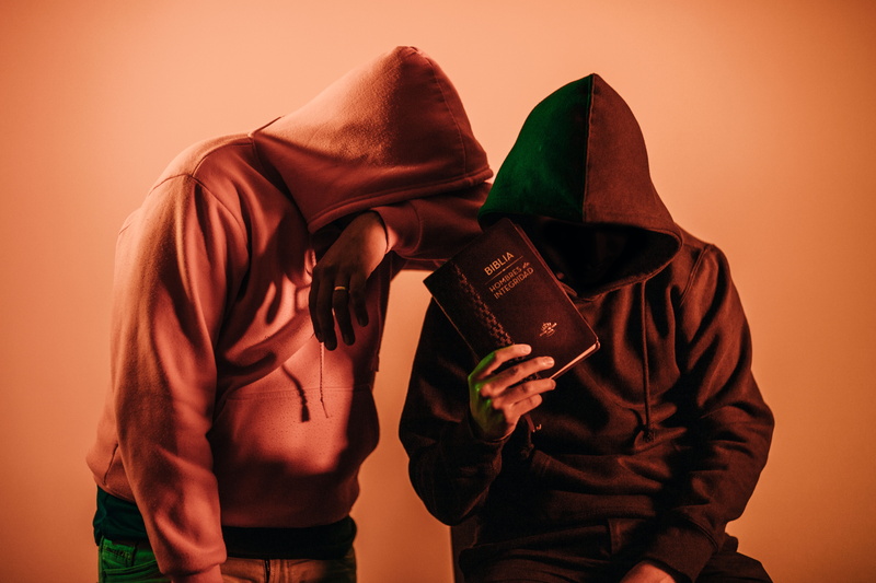 pullover, person, holy, portrait, hooded shirt, hoodies, standing, clothing, hiding, mask - disguise, faith, fashion, holding, veil, evil, jesus, book