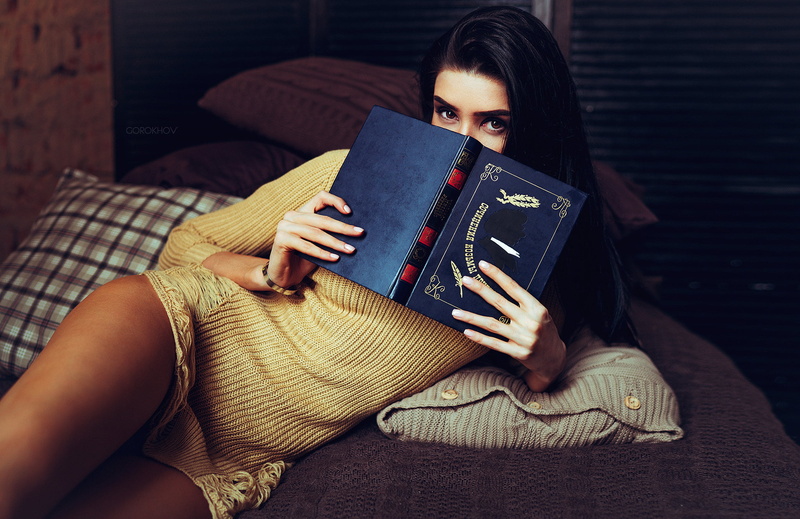 front view, long, soft, sofa, young adult, clothing, relaxation, tanned, portrait, 1080P, bind, looking at camera, book, women, holding, lifestyles, young women