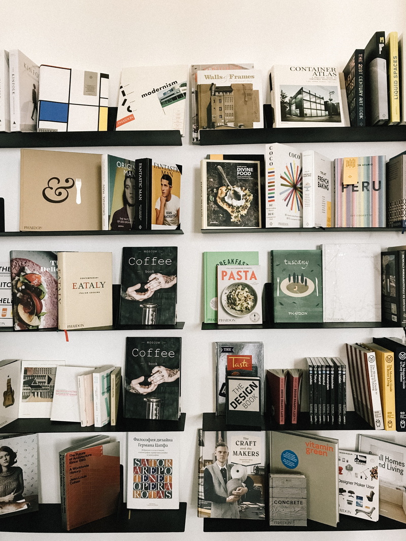 large group of objects, bookshelves, variation, abundance, room, learning, library, order, still life, for sale, data, assorted, text, research, book, in a row