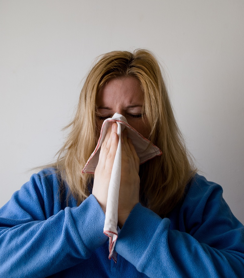 blond hair, grey, obscured face, illness, one person, allergy, healthcare and medicine, sneezing, face, facial tissue, hair, people, hairstyle, hand chief