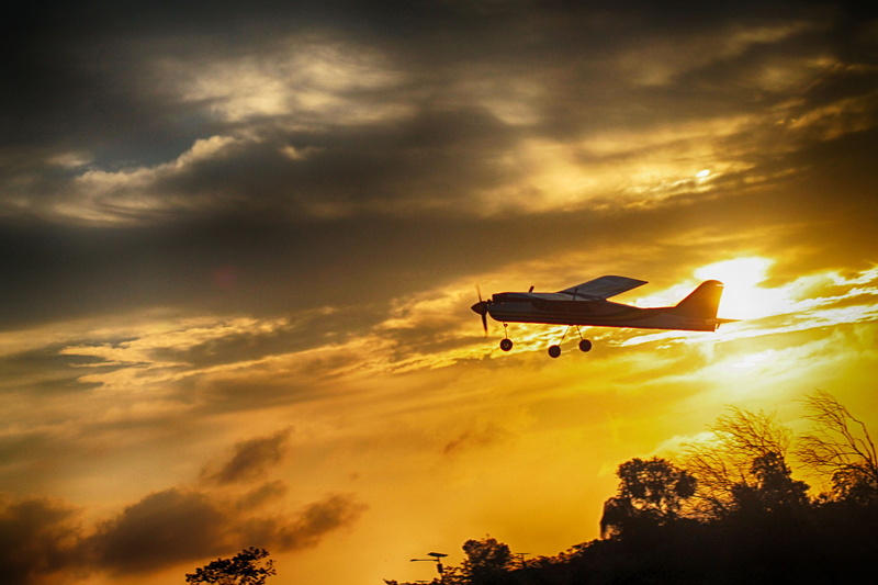 mid-air, indonesia, sun, outdoors, sunlight, rcplanes, freedom, model, sky, copy space, people, tac, rcmodel, leisure activity, beauty in nature, silhouette