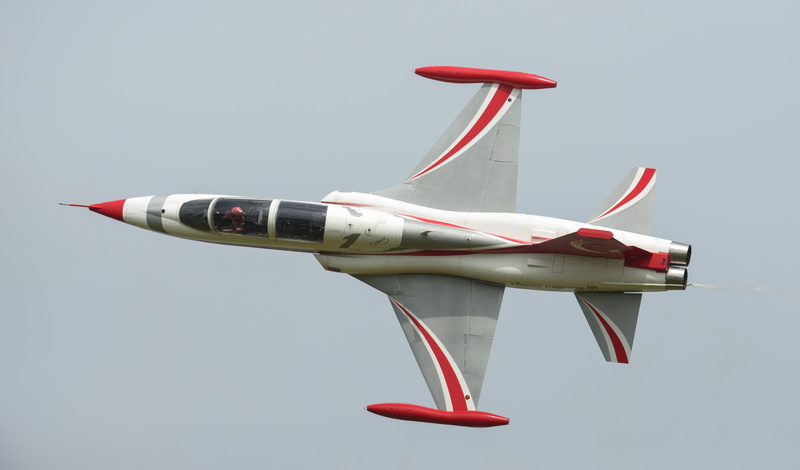 red, close-up, mid-air, air vehicle, mode of transportation, aircraft wing, model airplane, copy space, aircraft, no people, travel, plane, single object
