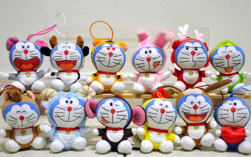 plush, fun, indoors, choice, retail, smiling, no People, rabbits, cultures, white, male likeness, people, human representation, cats, for sale, large group of objects