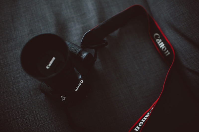 number, focus on foreground, 5K, textile, day, headphones, DSLR, black Color, red, boxing, key, black, eos, accessibility, still life, lens cap, gray