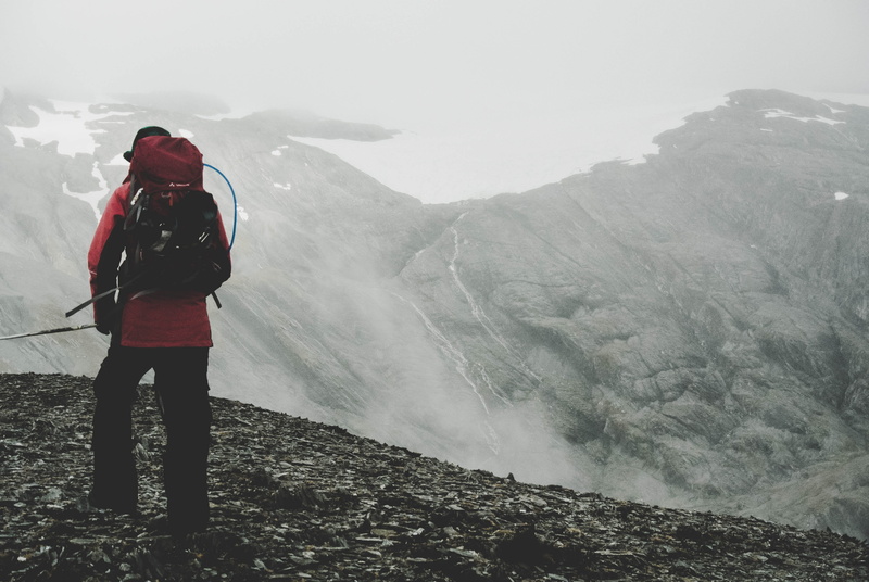 ice, holiday, leisure activity, mountain range, non-urban scene, full length, rockj, standing, one person, nature, stone, real people, rock, hiking, glacier