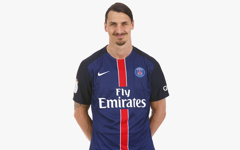 safety, indoors, looking at camera, uniform, men, one person, occupation, 2K, clothing, portrait, text, smiling, Zlatan Ibrahimovic, front view, white background