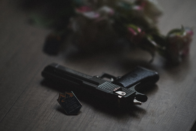 aggression, indoors, no people, focus on foreground, weaponry, social issues, selective focus, crime, gun, animal, grenade, vulture, shooting range, handgun