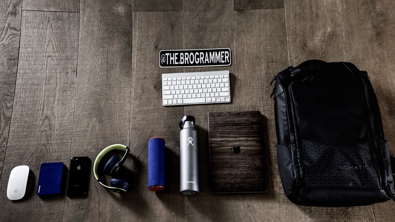 preparation, accessories, close-up, calendar, bag, tape player, still life, leather, wall, choice, phone, portable information device, diary, indoors, high angle view