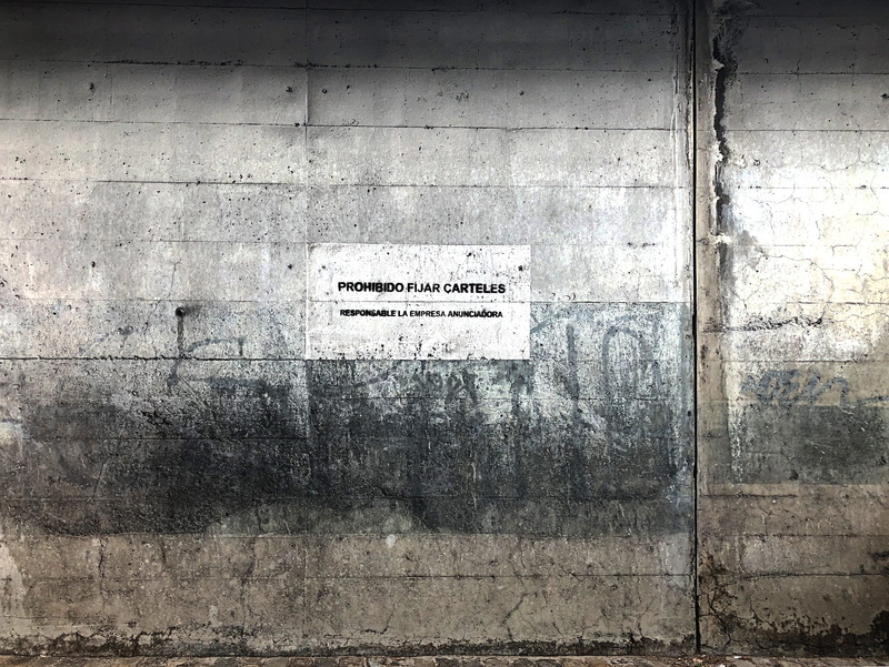 capital letter, shooting range, no people, weathered, concrete, information, garage, building, communication, 2K, close-up, madrid, wall, plaque, coat