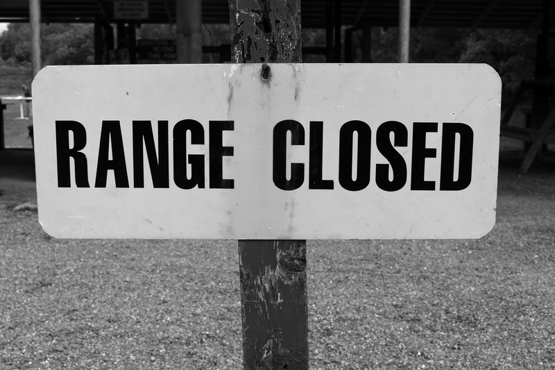 sign, western script, focus on foreground, trending, day, close-up, crime, script, capital letter, pole, shoot, range, nature, closed, shooting, warning sign