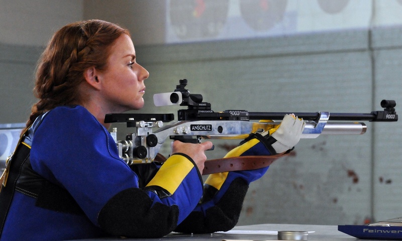 shoot, rifle, females, weapon, mid adult women, marksman, portrait, shooting, holding, range, focus on foreground, concentration, aiming, technology, indoors