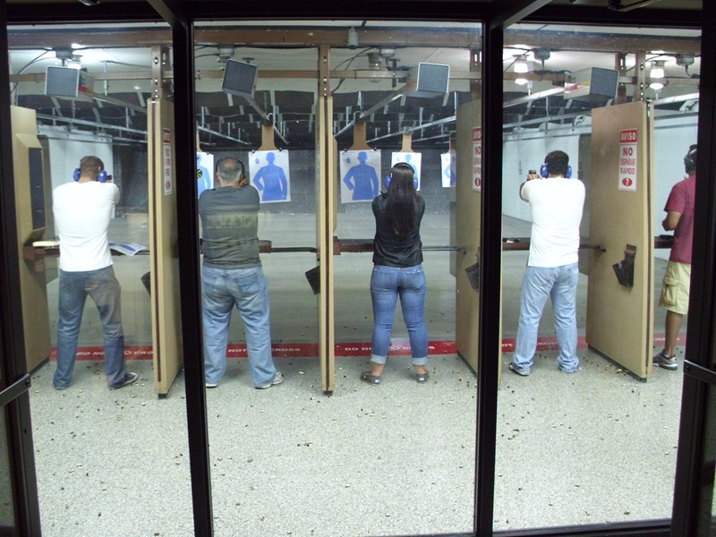 five, real people, pistol, door, gun, firing, people, transparent, clothing, training, indoors, reflection, range, male, lifestyles, practice, target, full length