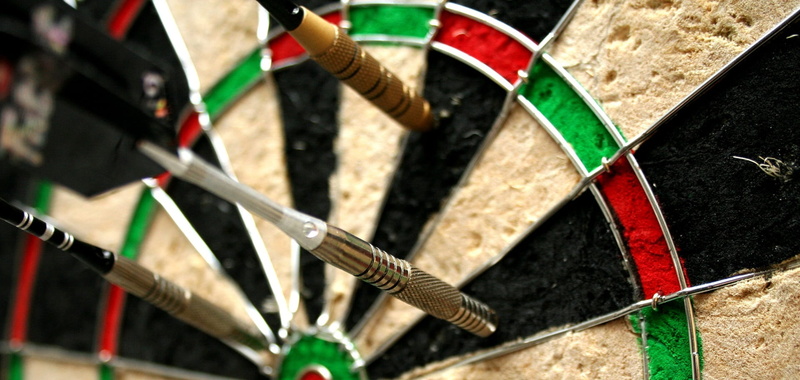 shadow, target, high angle view, darts, multi colored, recreation, arrow, dartboard, aim, built structure, city, pins, three, focus on foreground, accuracy