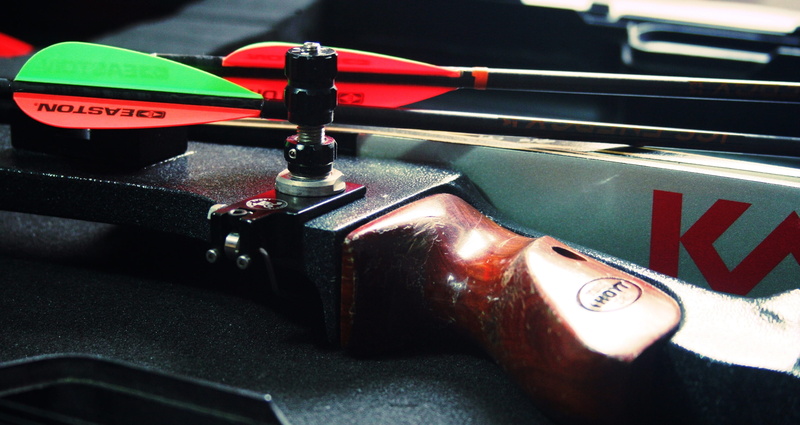 car, mode of transportation, technology, people, number, sport, text, shooting, indoors, 2K, arrow, arts culture and entertainment, game, machine part