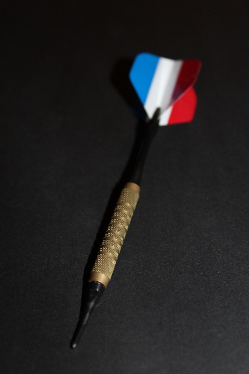 shadow, high angle view, close-up, two objects, simplicity, red, black color, studio shot, pen, dart, art and craft equipment, play, delivering, without fail