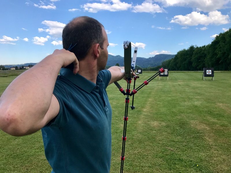 bow, delivering, front, 4K, land, hits, arrow, photography themes, archery, photographing, bulls eye, real people, objectives, camera - photographic equipment