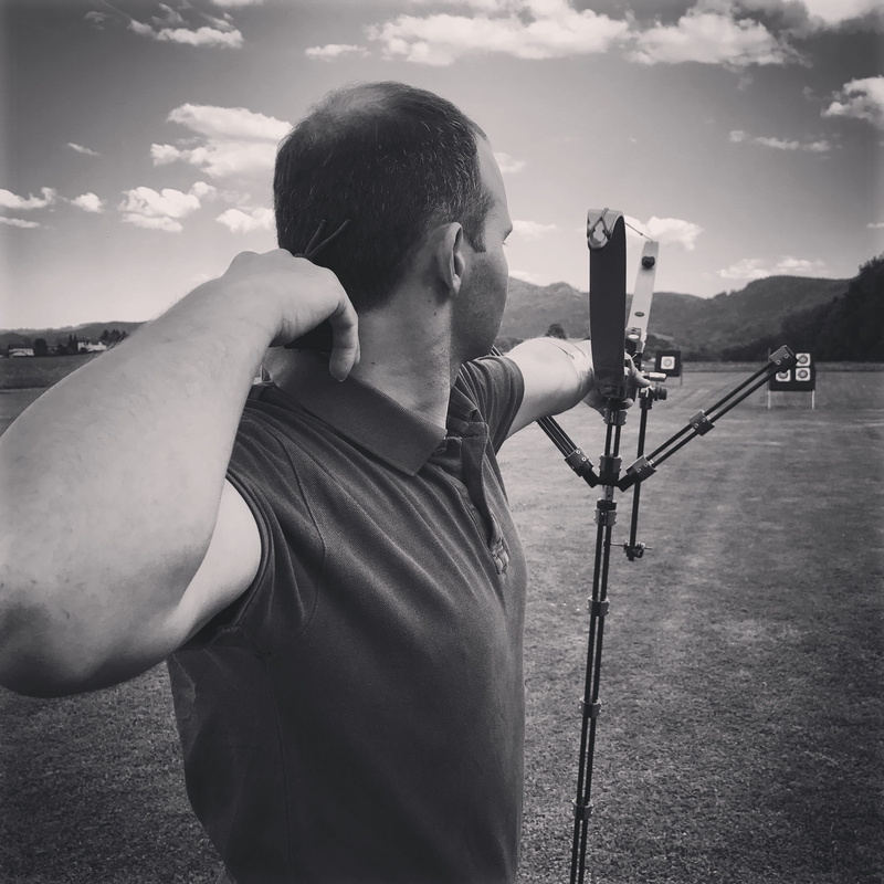 camera - photographic equipment, weapon, young men, communication, casual clothing, lifestyles, 2K, leisure activity, activity, bulls eye, sport, Archery