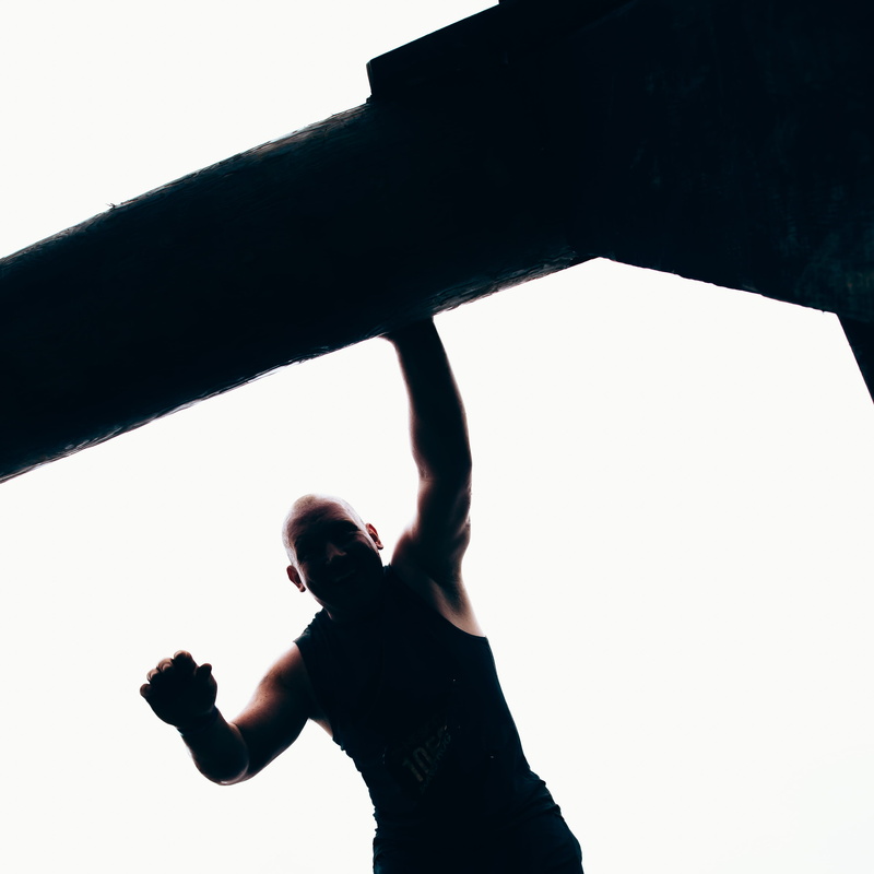 low angle view, patience, standing, day, one person, atlanta, men, leap, arms raised, 2K, outdoors, copy space, chance, jump, leisure activity, dark, clear sky