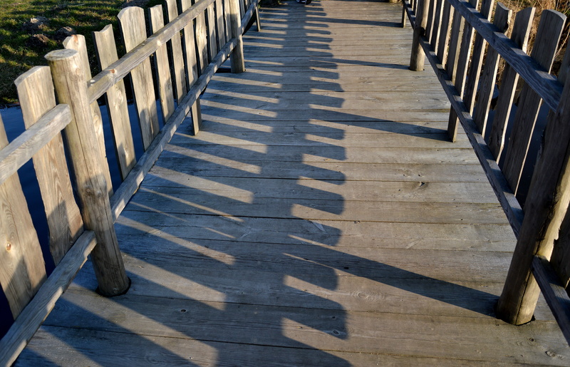 5K, seat, shadow, no people, railing, outdoors, bridge, footpath, wood - material, the fence, high angle view, wood, in a row, wood paneling, the way forward