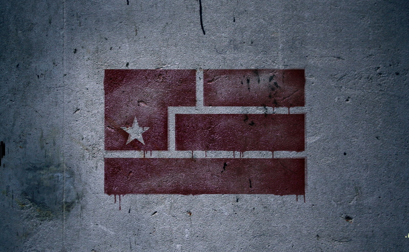 brick wall, arrow symbol, Resistance, inch, art, outdoors, red, built structure, white color, concrete, textured, Flag, wall - building feature, close-up