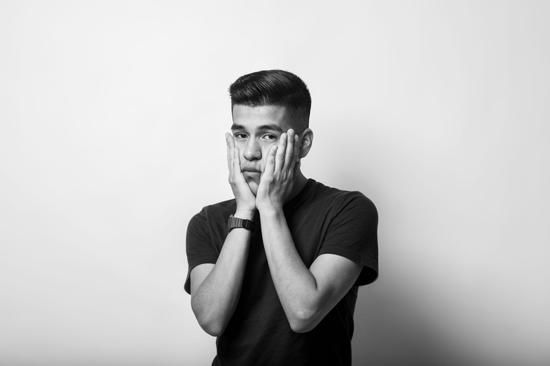 man, studio shot, t-shirt, censorship, casual clothing, one person, 4K, shirt, teenager, indoors, waist up, looking at camera, human face, white background