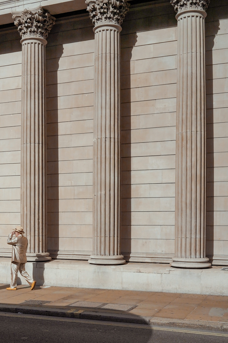 history, pavement, near, banking, style, man, bank, column, urban, walking, no People, hat, city, built Structure, concrete, outdoors, fashion, pillar