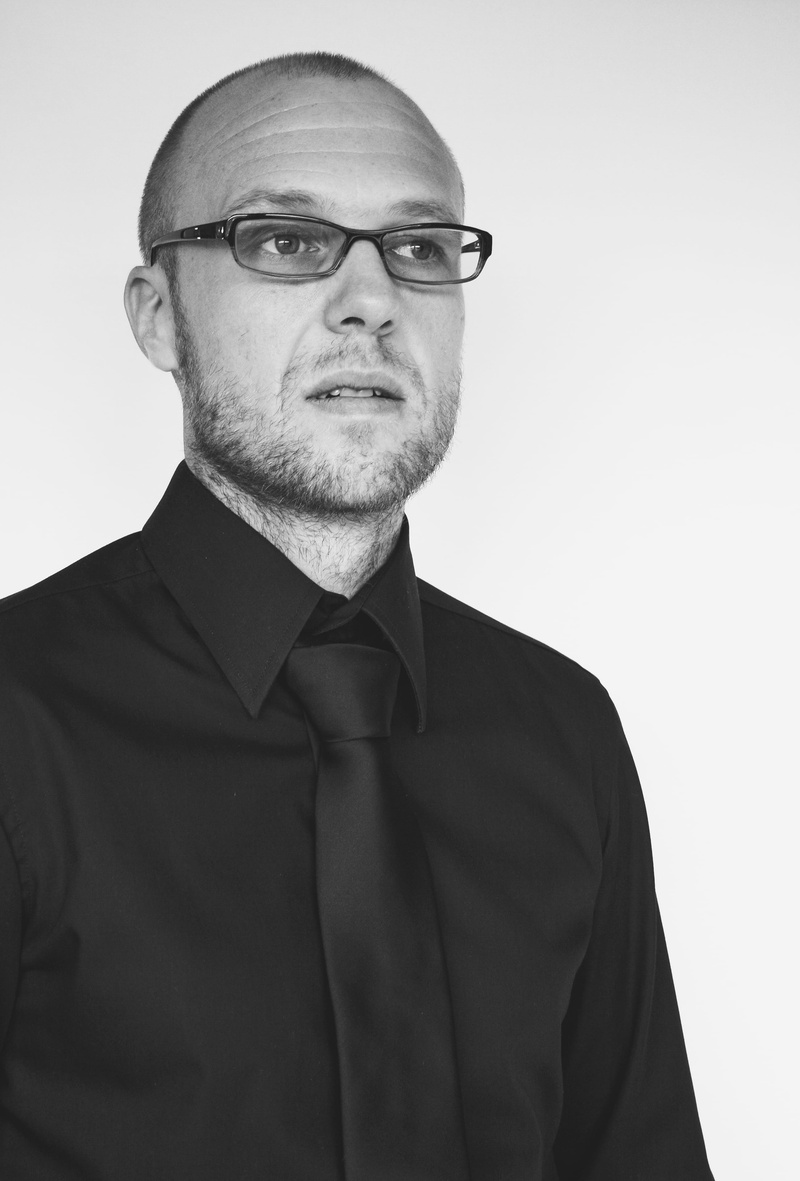 business, banker, real people, indoors, black, males, man, formalwear, tie, men, studio shot, contemplation, 2K, class, glasses, wall street, adult, eyeglasses
