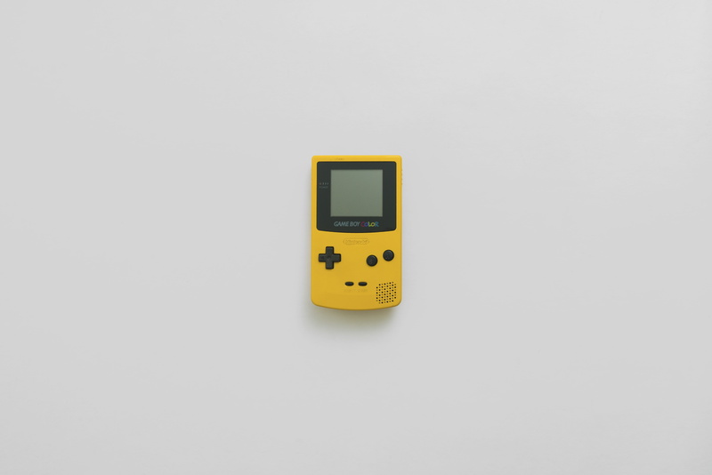 object, technology, gameboy, cable, no people, time, studio shot, 5K, white background, still, number, copy space, color, yellow, communication