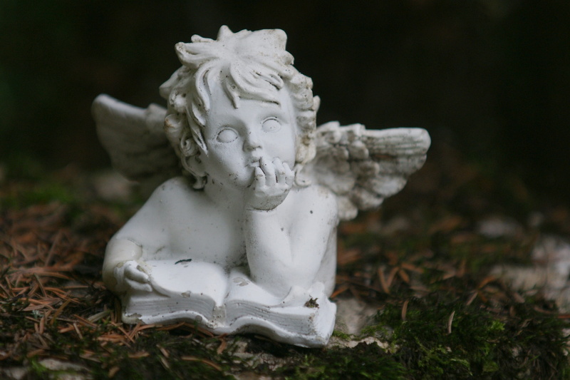 single object, cemetery, focus on foreground, close-up, human representation, craft, day, outdoors, hope, representation, mourning, no people, sculpture
