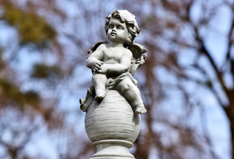 creativity, representation, girl face, decoration, no people, christianity, focus on foreground, art, history, mourning, cemetery, angel figure, human representation