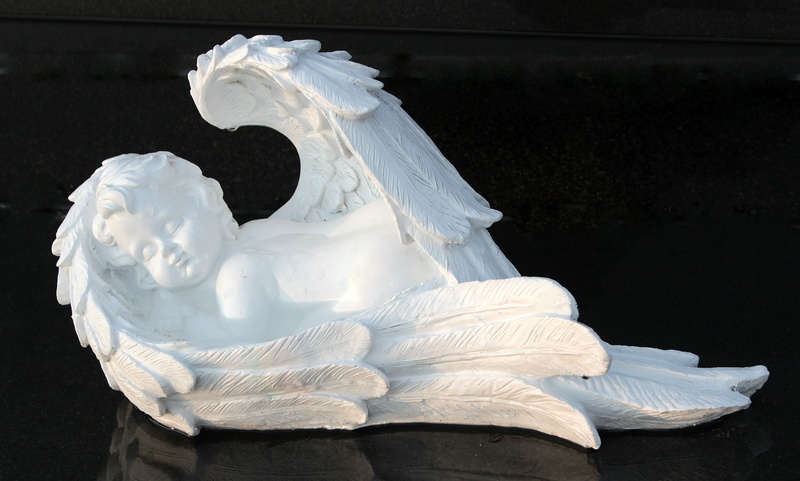 angel figure, angel face, female likeness, faith, small, figurine, close-up, angel, food and drink, Cherub, one animal, day, carving - craft product, sweet