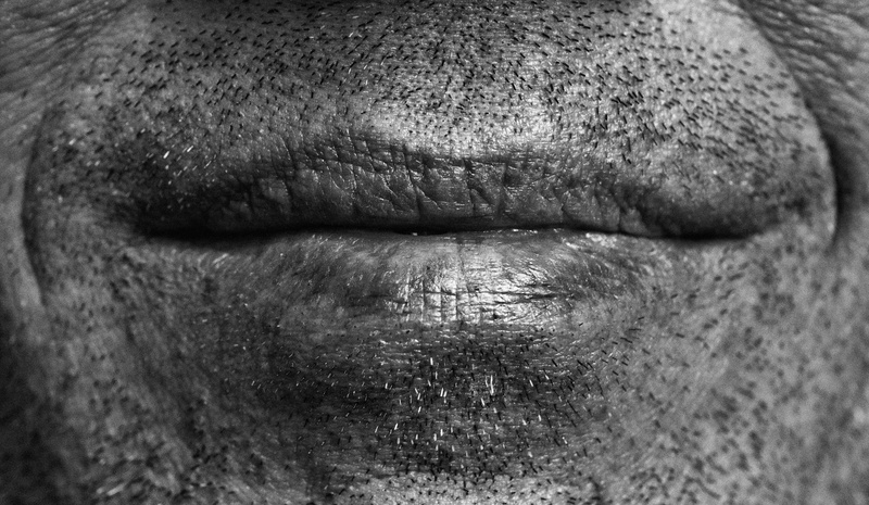human face, pros and cons, eyebrow, the corner of his mouth, real people, human body part, person, black and white, skin, beard stubble, bart, facial hair
