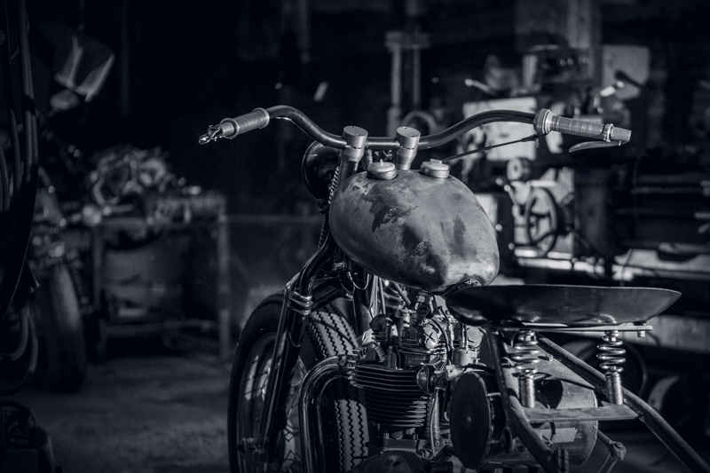stationary, focus on foreground, occupation, wheel, city, triumph, mode of transportation, street, no people, transportation, 4K, motorcycle, indoors