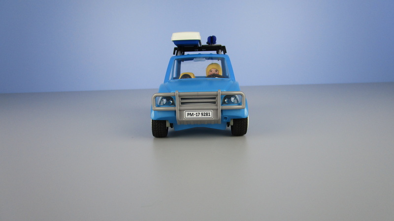 blue, toy car, toy, gray, indoors, copy space, gray background, mode of transportation, transportation, roof box, miniature, front view, blue background