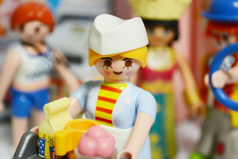 female likeness, retail, focus on foreground, children, indoors, miniatures, doll, adorable, craft, 2K, store, ornament, selective focus, design, childhood