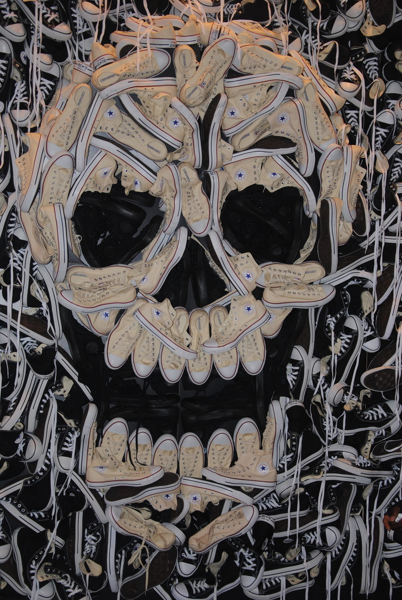 close-up, day, skull, art and craft, converse, marketing, shoes, indoors, skull and crossbones, art, no people, cult, skeleton, black color, brand, sculpture