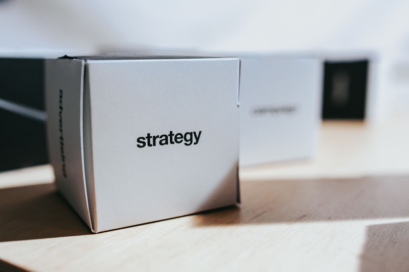 close-up, boxes, table, words, cardboard, architecture, still life, white color, text, day, strategy, focus on foreground, studio shot, selective focus