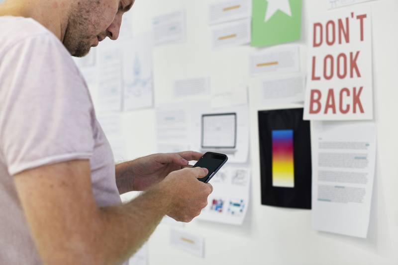 white, computer monitor, technology, holding, communication, real people, adult, people, wall, bulletin board, working, screen, phone, 5K, portable information device