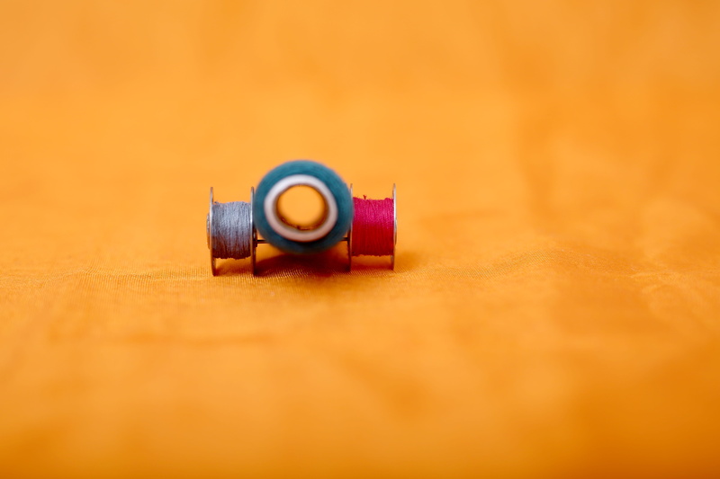 fabric, colors, garment, manufacturing, thumbtack, no people, creativity, colored background, tailor, clothing, sewing thread, accessories, close-up, studio shot