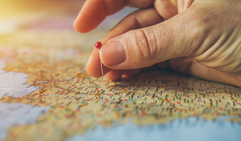 index finger, choice, direction, pinned, maps, indoors, travel, countries, human hand, atlas, pinning, people, adult, person, human finger, finger, guidance